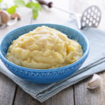 Mashed potatoes in blue bowl